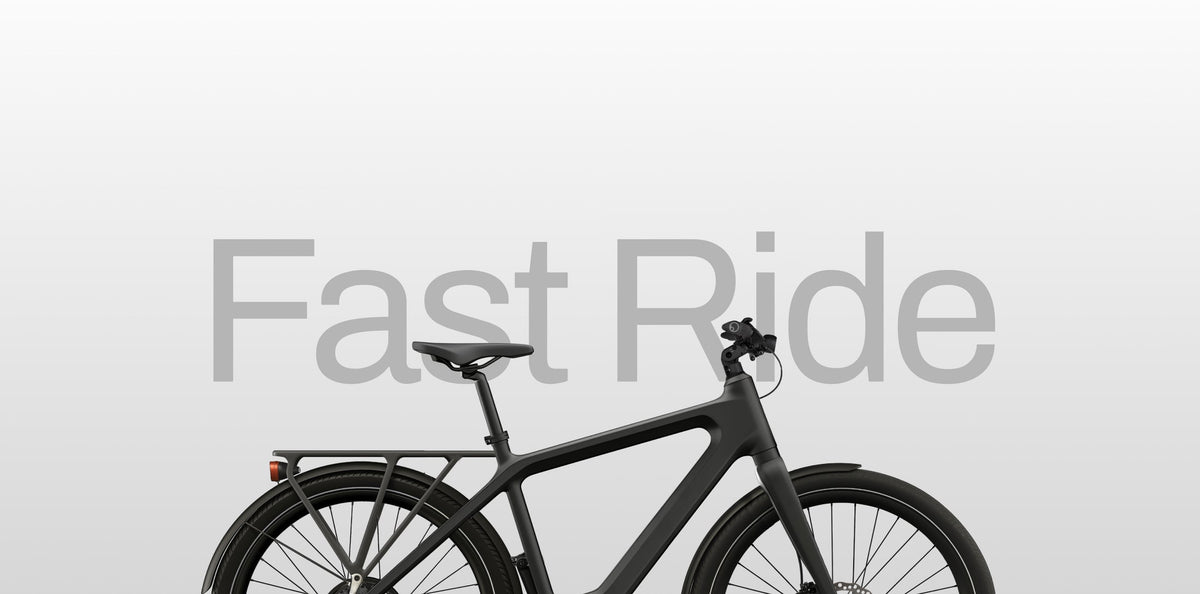 Zwarte Cowboy e-bike met bagagedrager voor snelle ritten in de stad